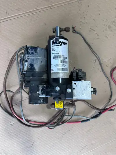 Hi, I am selling a pair of 2 Meyer hydraulic E58 snow plow pumps along with a 4 way arctic plow cont...
