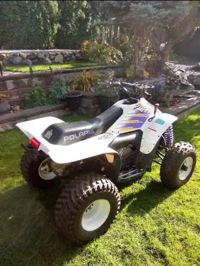 1996 Polaris Scrambler 4X4, oil injected, 2 stroke, very nice condition, electric start with pull st...