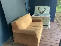 Loveseat which pulls out for sleeping