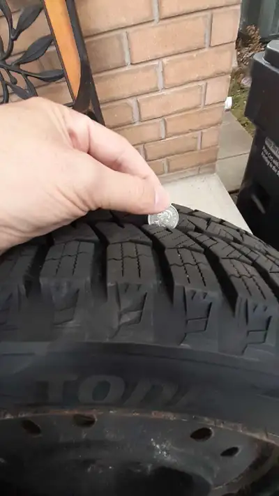 Selling four sets of Bridgestone BLIZZAK WS90 205/60R16, 16 inch. winter tires on black steel rims....