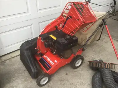 TROY BILT 5HP SELF PROPELLED LAWN VACUUM/BRANCH CHIPPER, View more