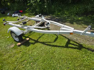 Boat trailer with roller bunks. Used for 16ft boat. Everything works as it should.