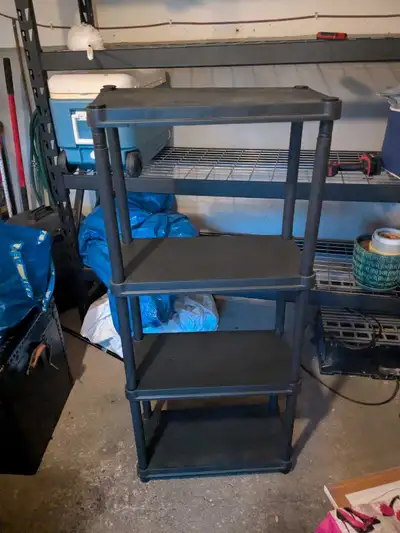 Plastic Shelving Kit. Easy to assemble. 4.5 foot high, 2 foot wide, 1 foot deep.