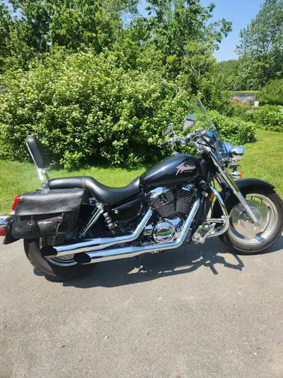 Included with purchase is one extra new battery,large mens rain geer, oil/filters, back rack bag, bi...