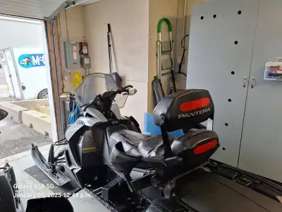 Cat serviced and ready to go. Heated seats front and back. Heated grips. Ice scrapers. Storage bags....
