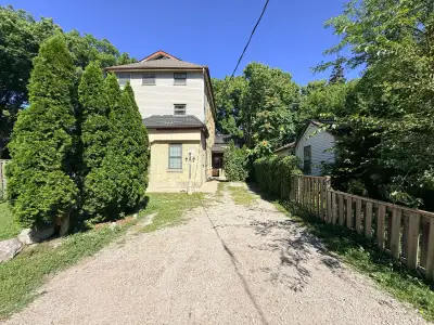 Welcome to a peaceful and beautifully private main-level rental unit 10. This charming 2-bedroom off...