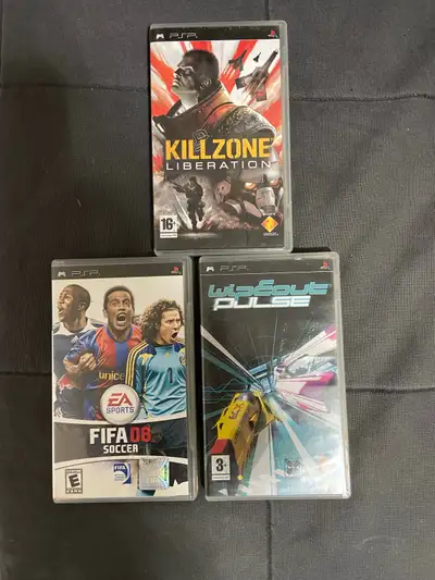 Selling a lot of three used PSP games: Killzone Liberation, Wipeout Pulse, and FIFA 08. All games ar...