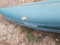 Damages canoe for sale