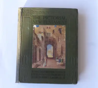 Published by Scripture Gift Mission in 1912 this pocket edition of The Pictorial New Testament is fi...