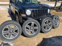 215 60 17 on Jeep / Chrysler Alloys 