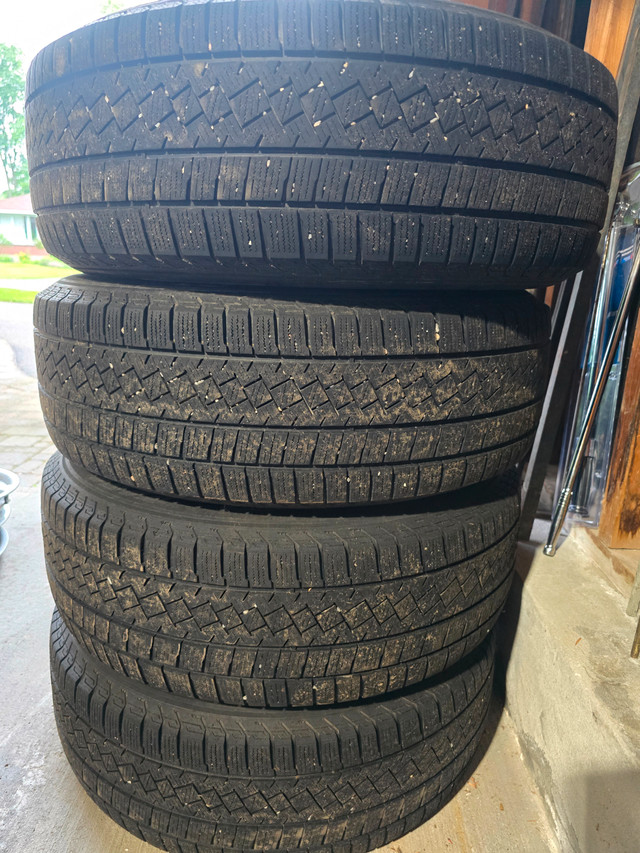 Pirelli Ice Zero winter tires 225/65/17 on aluminum wheels. in Tires & Rims in Ottawa