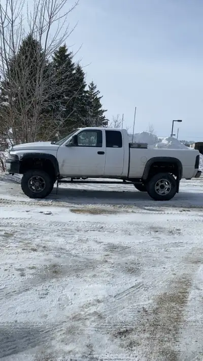 Fresh saftey 2001 dodge ram 2500 on 6” lift 5.9 cummins 4wd 4” turbo back exhaust with a small muffl...