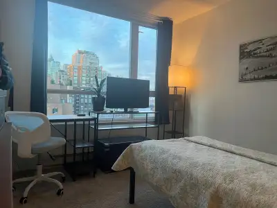A furnished private master bedroom with private full bathroom in 2 bedroom condominium on the 16th f...