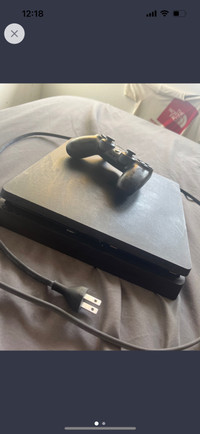 PS4 with controller 