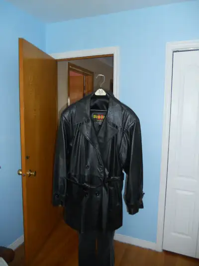 Leather Jacket For Women Size: XL Color: Black ¾ Length, w/belt. Very Good Condition For more inform...