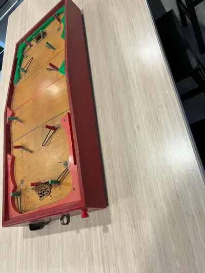 Relive the glory days of tabletop hockey with this Munro Games Limited vintage hockey game, proudly...
