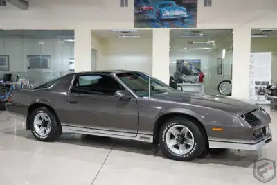 In search of an 82-84 z28 camaro, must be ttops and prefer manual trans but will look at autos, pref...