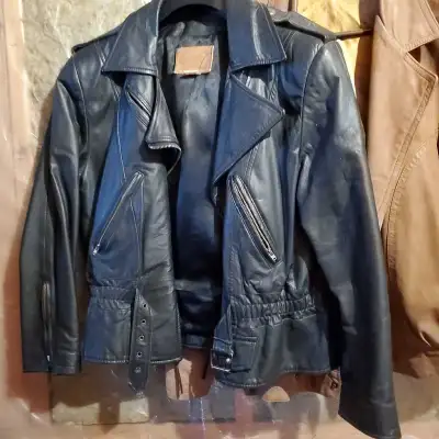 Ladies black leather motorcycle jacket and gloves, View more
