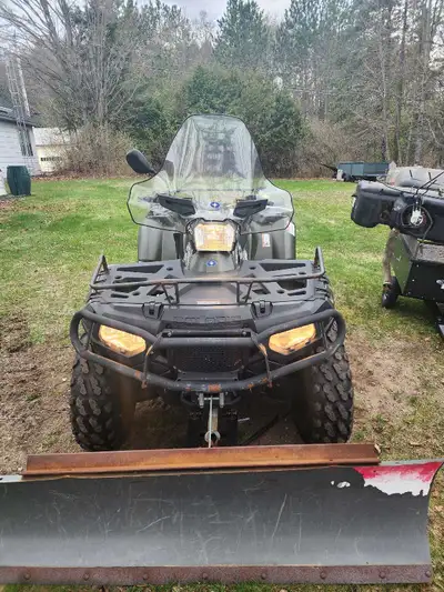 2013 Pokaris Sportsman Twin 850 EFI HO Comes with plow and hitch and brand new never worn helmet(wor...