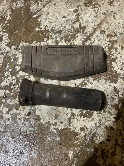 From a 84 Honda 200s. Triple tree guard. And exhaust spark arrester. Trikes been long gone. No use,...