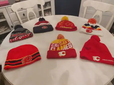 Calgary Flames toques and scarves 10$to 20$each , View more