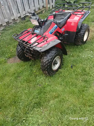 Father and son quads 1988 kawasaki 300 bayou semi automatic runs and works very well 1400 cash no ow...