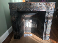 Cast iron decorative fireplace insert
