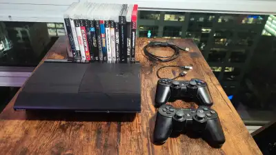 PS3 with 14 games, View more