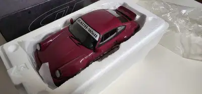 Car has never been taken out of the box. It comes from a pet and smoke free home.