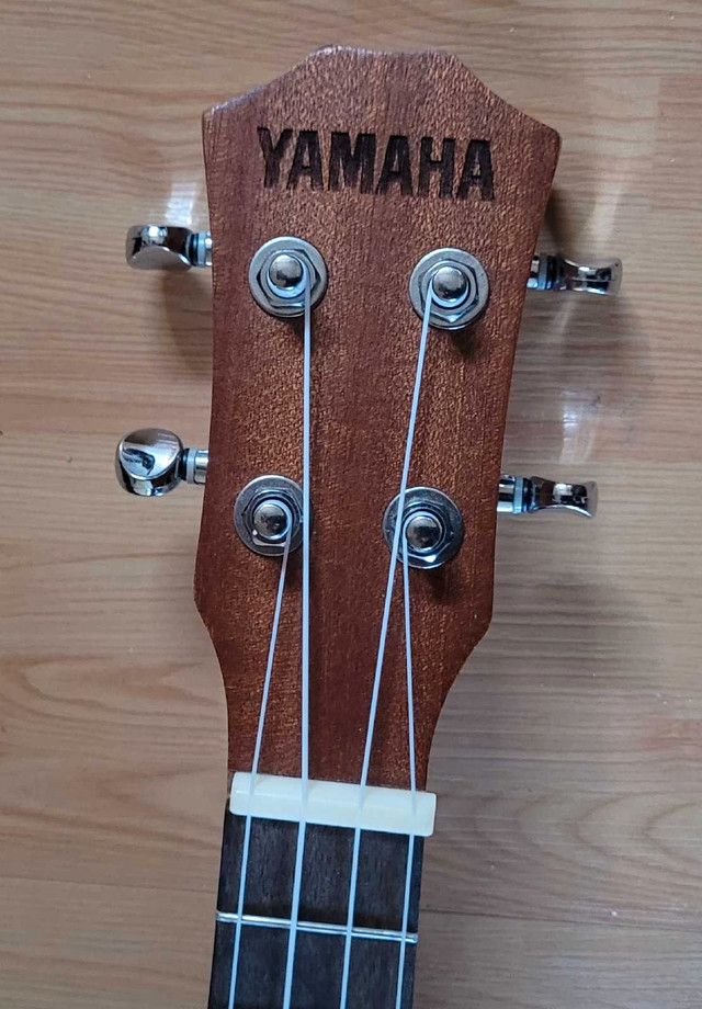 Yamaha 4 String Ukulele with Carrying Case. Model  - Y-UK- 24 in Guitars in Oshawa / Durham Region - Image 4