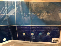 Neuf surmatelas en plumes de luxe pour lit king