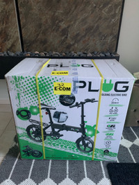 PLUG Foldable Electric E-Bike: NEW AND SEALED