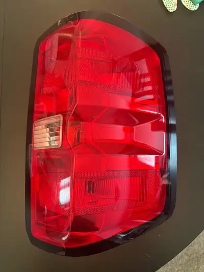 This is a brand new factory-style replacement tail light housing assembly for a 2014-2019 Chevrolet...