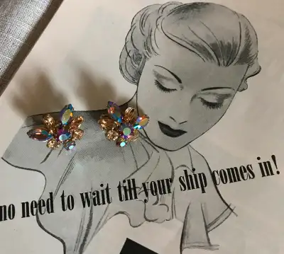 Vintage Mid Century SHERMAN Signed Aurora Borealis Rhinestone Clip On Earrings. So beautiful and spa...