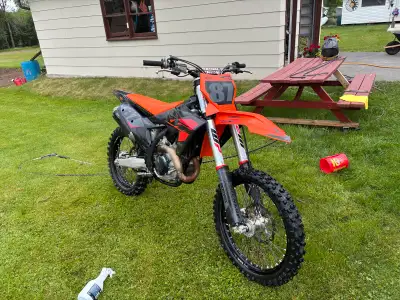 23 ktm 450 with 54 hours. Rebuilt at 43 hours as precautionary from dealer with receipts. I have spa...