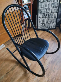 rocking chair..metal tube with padded seat
