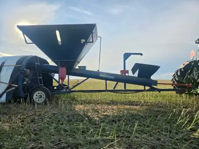 In good condition. 16 inch auger. Truck dump has never been used. Hydraulic bag lift