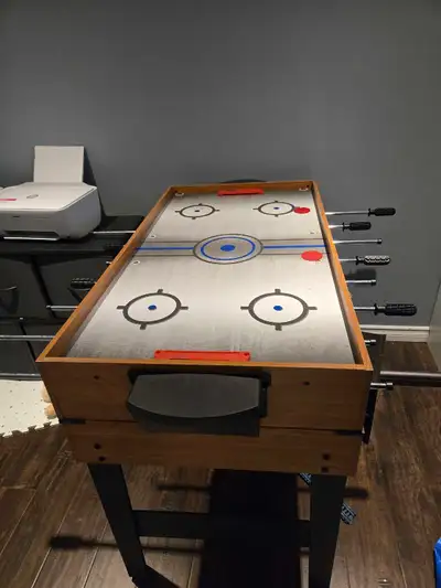 3-in-1 arcade table. Air hockey, pool, foosball. Like new condition, sturdy and heavy table, tournam...