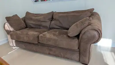 Faux suede 2 person couch (but can fit 3). Comfy with fluffy cushions. 200$ OBO