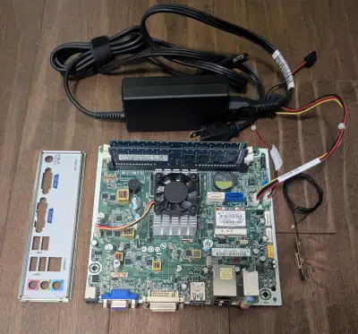 HP mini ITX motherboard w/CPU and memory, View more