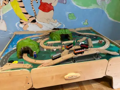 Train set with wood table, in good condition, Can freely combine the track as you wish. Great toy fo...