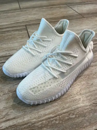 These are look like Adidas Yeezy Boost 350 V2 sneakers are available for purchase and are new. These...