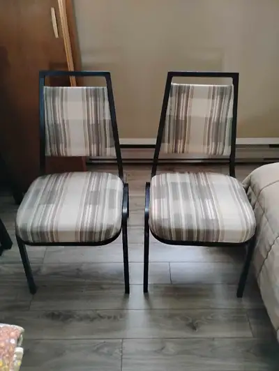 2 comfy and solid chairs, as seen in pics. Multi color but mostly sage in colour. $55 obo for both.