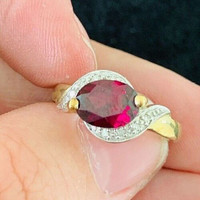 Please find for sale a magnificent 9ct gold garnet & diamond rin