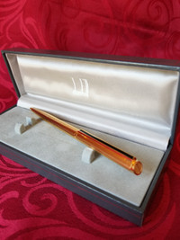 Classic Dunhill Ballpoint Pen gold plated with lacquered clip.