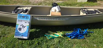 Complete Canoe package. 16’ adventure mad river canoe. Comes with new in box rope hoist, new in box...