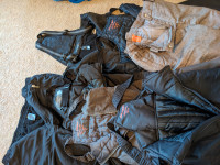 8 kids snowpants and a winter jacket