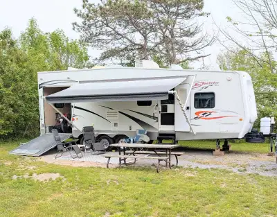 Selling this KZ Sportsman sportster side load toy hauler. This is a one of a kind trailer in great c...
