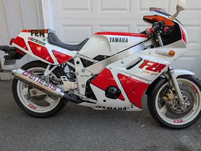 I am selling a used Yamaha FZR400 sportbike, known for its nimble handling and sporty performance. T...