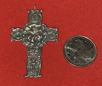 Selling a Vintage Celtic Cross Pendant made of pewter He Is Risen Signed HMK CDS 1997 Easter Cross....